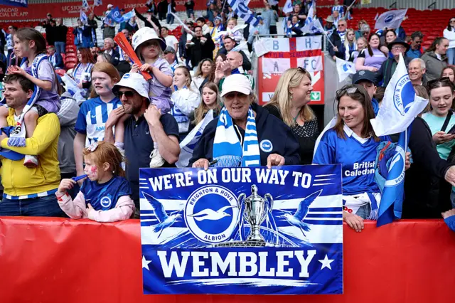 Brighton fans woith a "we're on our way to Wembley' flag