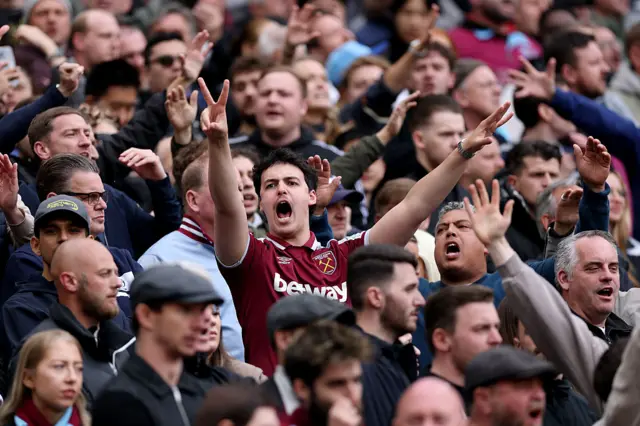 West Ham fans cheer in the stands