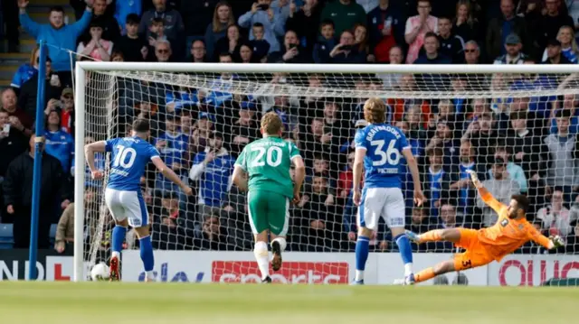 Chesterfield's Lee Bonis sends his penalty towards the post