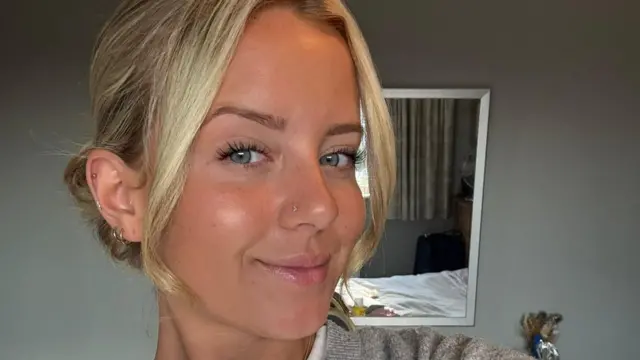 Lily Graham taking a selfie and smiling