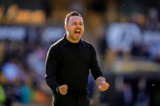 Roberto De Zerbi celebrating