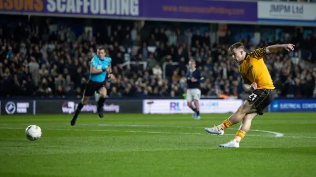 Joe Gelhardt shoots to score Hull's second at Millwall