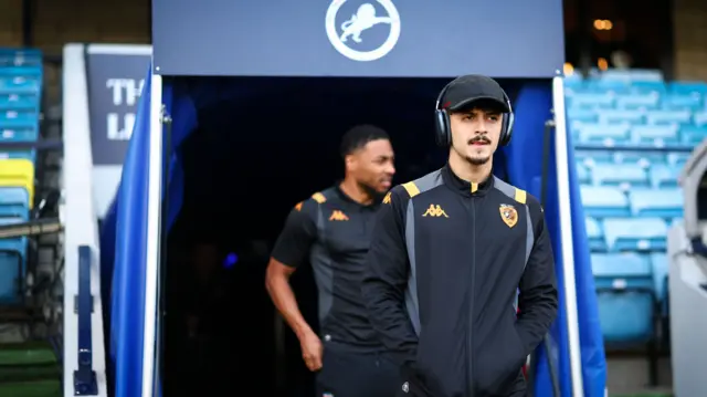 Hull City players arriving at The Den to inspect the pitch