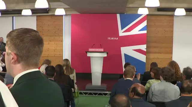 The lectern Starmer is about to speak from