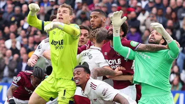 Pablo of West Ham United fouls David Raya of Arsenal resulting in a late equalising goal for West Ham being disallowed by VAR