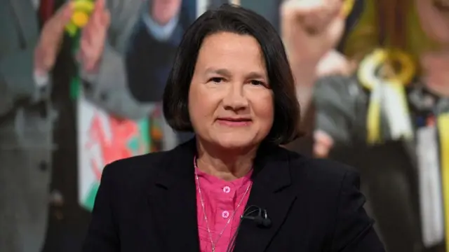 Catherine West pictured in pink shirt and black blazer