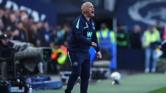 Millwall boss Alex Neil shouts from the touchline