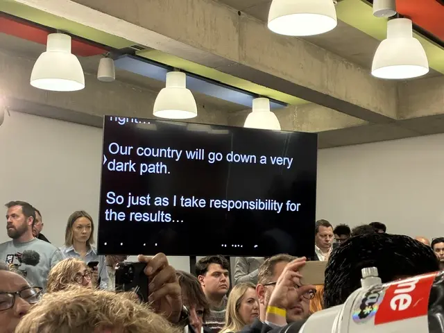 An image of an autocue in the room for Starmer's speech