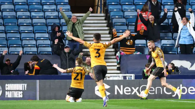 Hull's Joe Gelhardt slides on his knees in front of the away fans