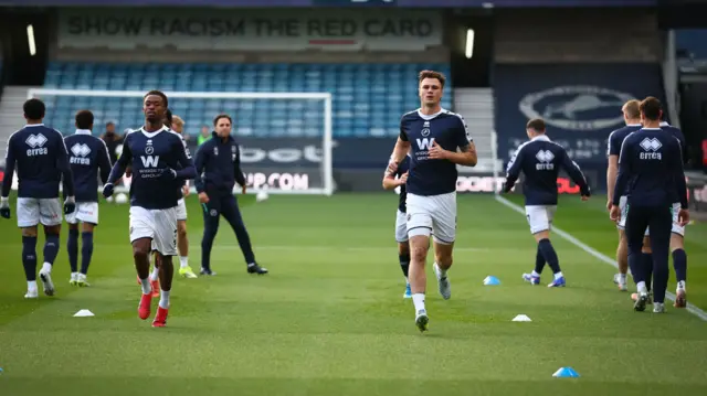 Millwall players warm up