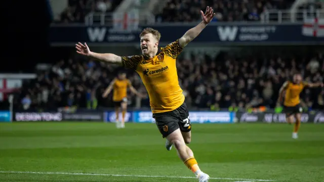 Joe Gelhardt celebrates scoring Hull's second at Millwall