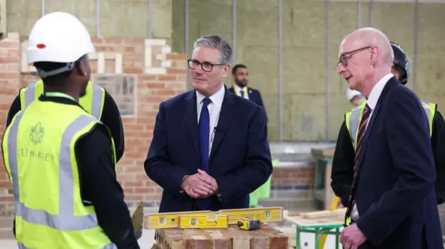 Keir Starmer stands in a construction site Pat McFadden