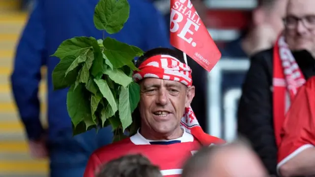 A Middlesbrough fan with a branch in his headscarf
