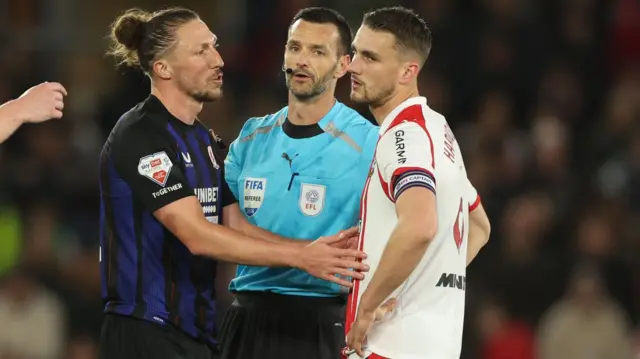 Luke Ayling with Southampton's Taylor Harwood-Bellis