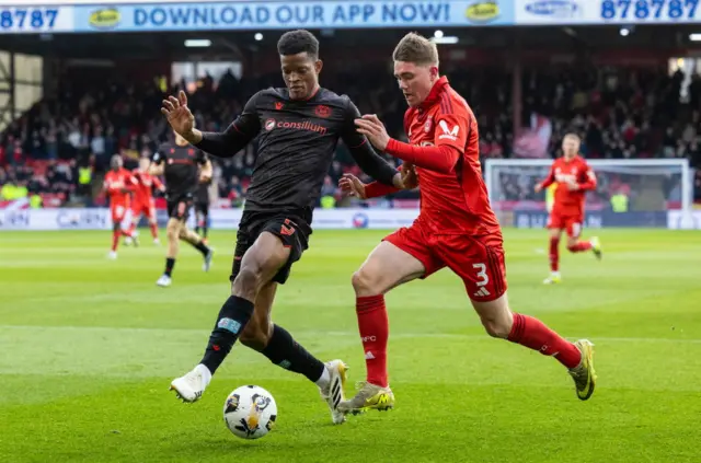 St Mirren's Richard King (left) and Aberdeen's Mitchell Frame