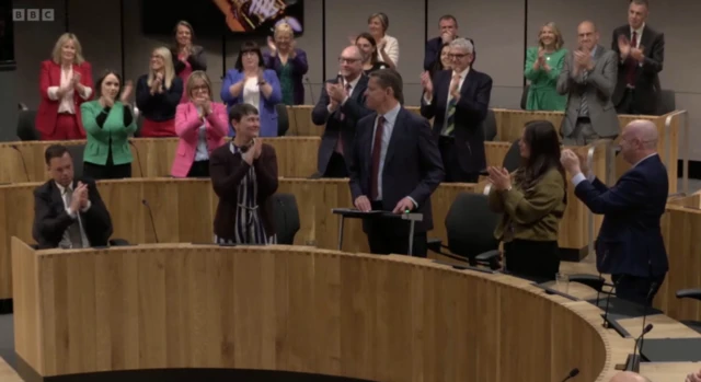 Rhun ap Iorwerth receives a standing ovation in the Senedd