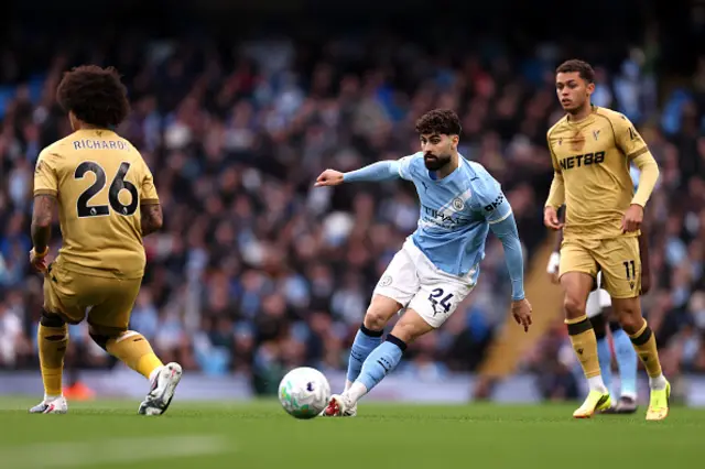 Josko Gvardiol of Manchester City passes the ball