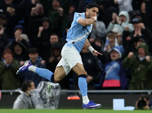 Omar Marmoush celebrates