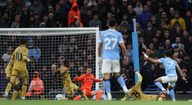 Dean Henderson concedes a second goal, by Manchester City's Egyptian striker #07 Omar Marmoush