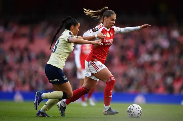 Pacheco tracks Pelova as she dribbles through the middle