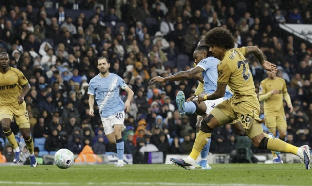 Manchester City's Antoine Semenyo scores their first goal