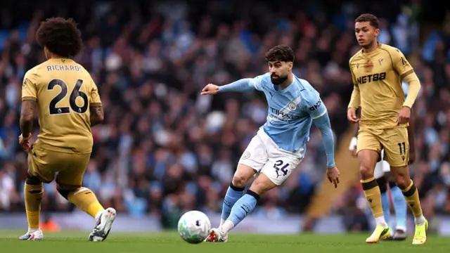 Josko Gvardiol of Manchester City passes the ball