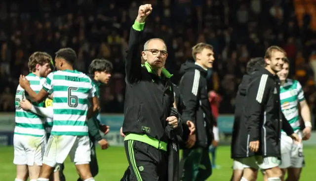 Celtic manager Martin O'Neill salutes visiting fans at Fir Park