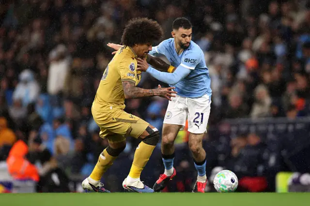 Rayan Ait-Nouri of Manchester City and Chris Richards of Crystal Palace battle for possession