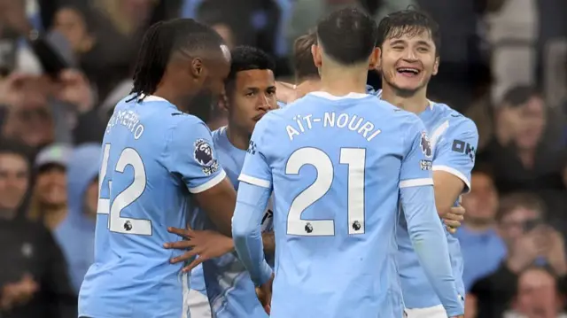 Manchester City's Brazilian midfielder #26 Savinho (2L) celebrates scoring the team's third goal with Manchester City's Ghanaian midfielder #42 Antoine Semenyo (L) and teammates