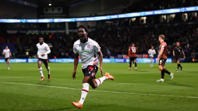 Bolton's Amario-Cozier-Duberry running away to celebrate scoring the goal in the first leg of their play-off against Bradford City