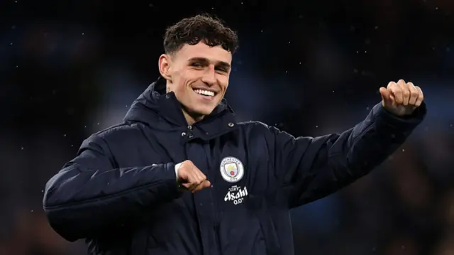 Phil Foden of Manchester City acknowledges the fans a