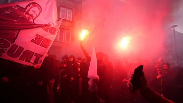 Hearts fans with pyro outside Tynecastle
