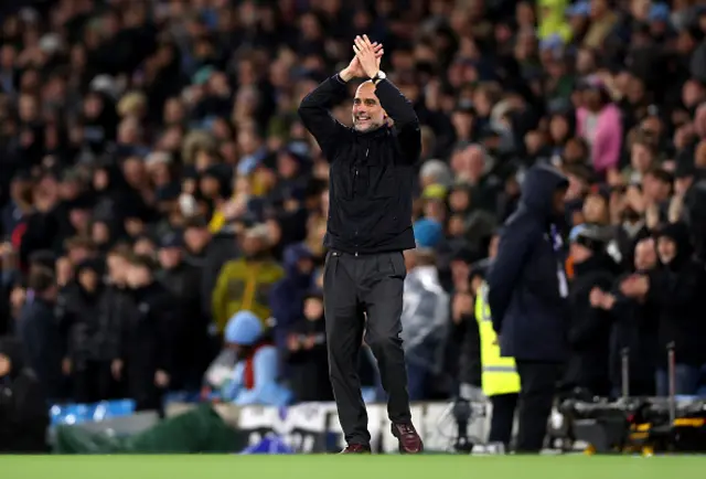 Pep Guardiola, Manager of Manchester City, celebrates