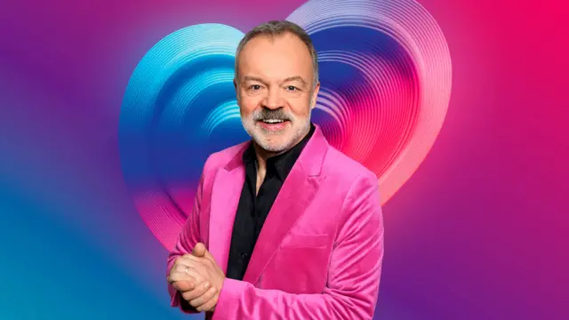 Graham Norton in a pink velvet jacket