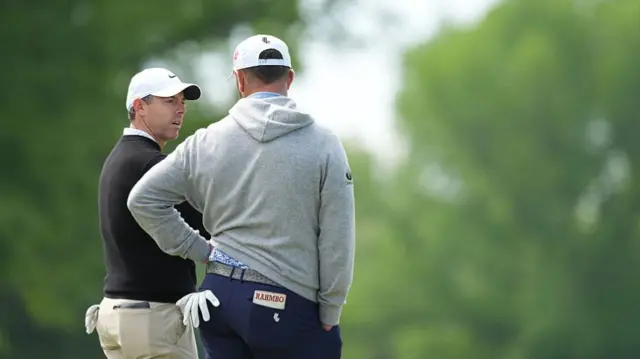 Rory McIlroy and Jon Rahm