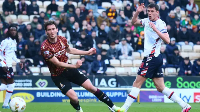 Bolton's Eoin Toal shoots wide