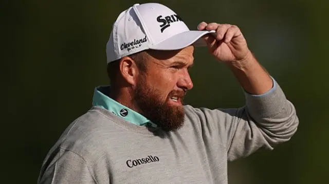 Shane Lowry lifts his cap