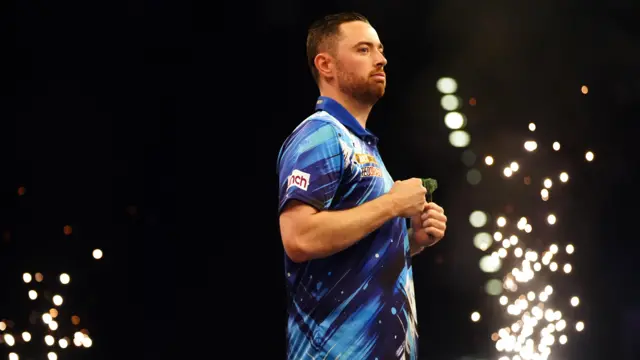 Description Luke Humphries celebrates following victory in the semi-final match against Luke Littler (not pictured) during night fifteen of the 2026 BetMGM Premier League at the Utilita Arena, Birmingham
