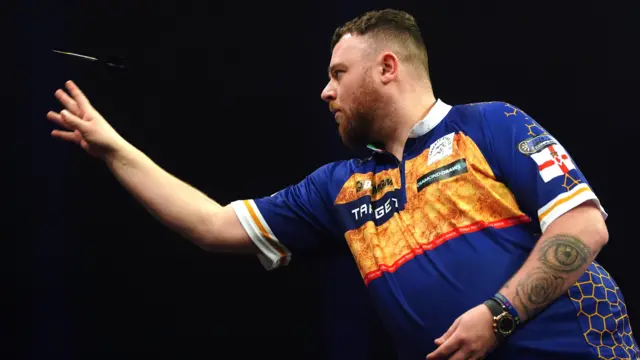 Josh Rock in action during the quarter-final match against Gian van Veen (not pictured) on night fifteen of the 2026 BetMGM Premier League at the Utilita Arena, Birmingham