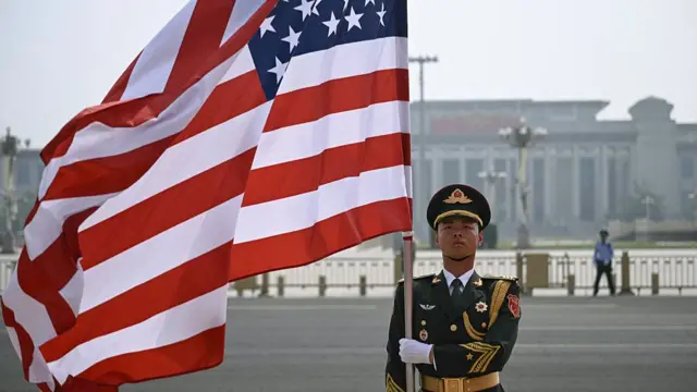 Soldier raises the US flag