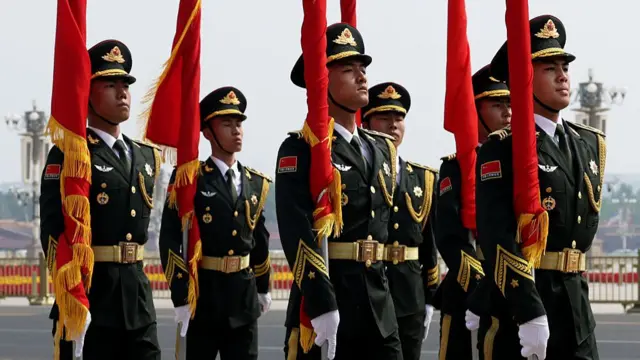 Soldiers marching into position
