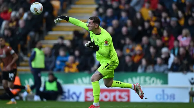 Bolton keeper Jack Bonham throws the ball downfield
