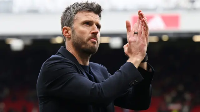 Michael Carrick applauds fans