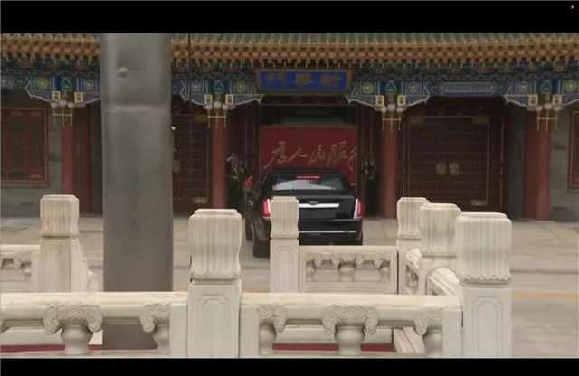 A. black car is seen arriving