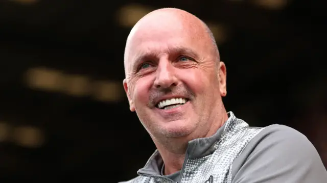 Paul Cook smiling