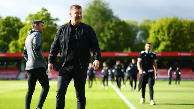 Karl Robinson on the pitch