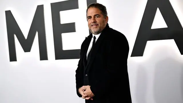 Brett Ratner wearing a suit