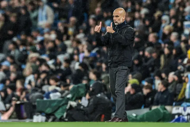 Pep Guardiola doing the thumbs up