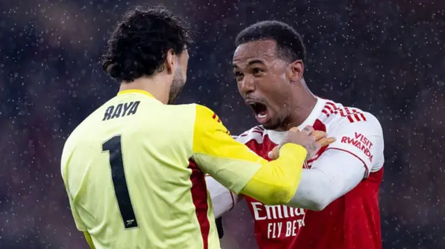 Arsenal goalkeeper David Raya and centre-back Gabriel celebrate together
