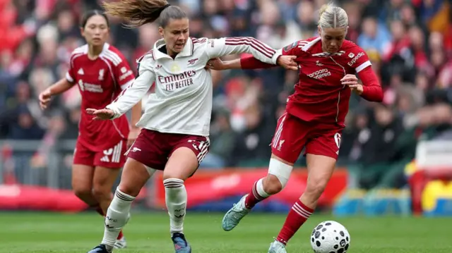 Victoria Pelova grabs hold of Denise O'Sullivan